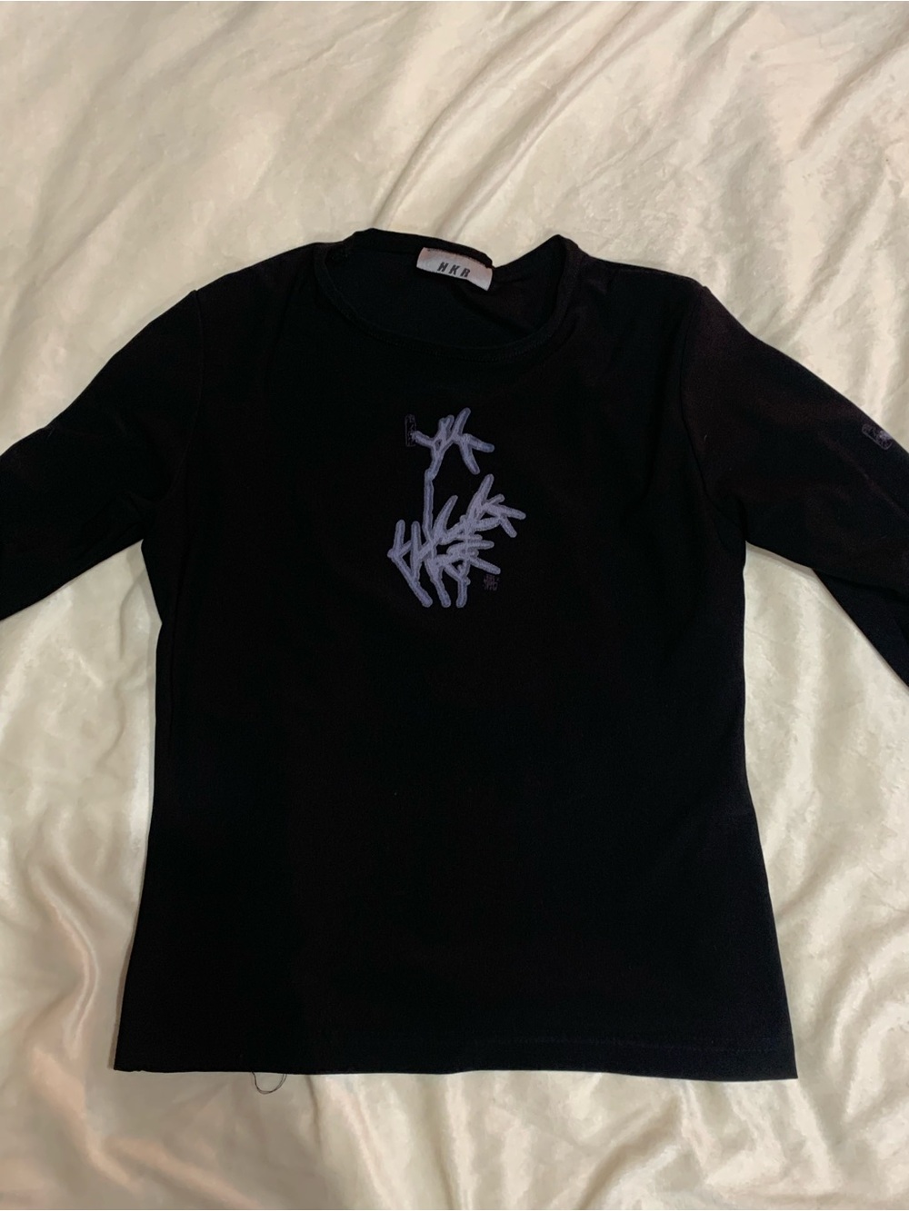 Black Long-Sleeve Tee with Lavender Embroidered Motif